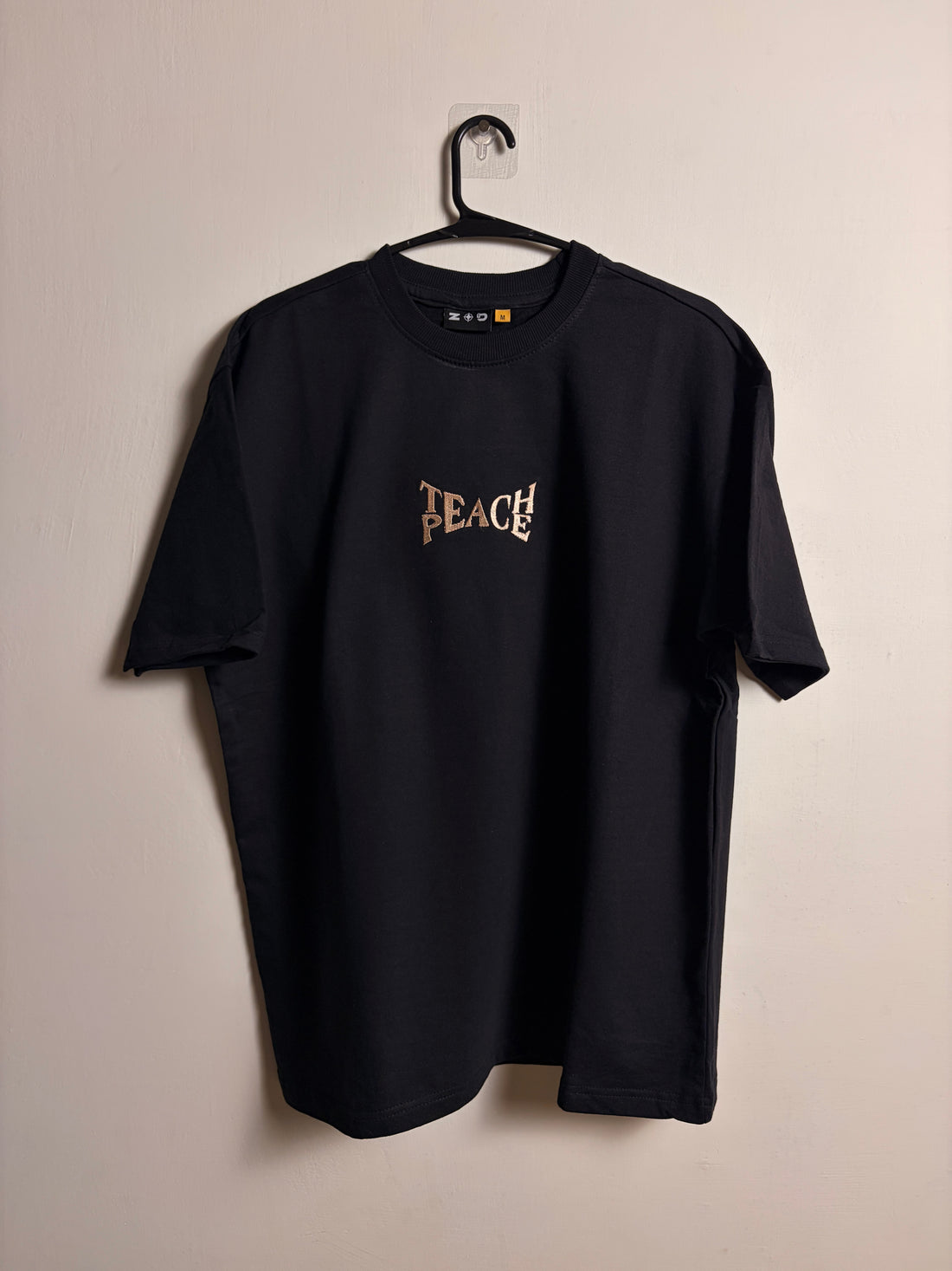 TEACH PEACE EMBROIDERED TSHIRT